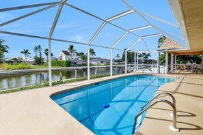 Outdoor pool, a heated pool - RARE Waterfront Western Exposure Vacation Home - Best Sunset Views & FREE WiFi (Marco Island)