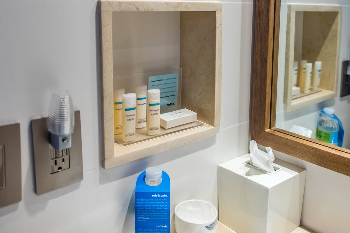 shower, free toiletries, hair dryer, towels