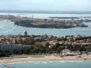 On the beach, sun-loungers, beach towels