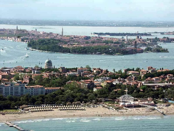 On the beach, sun-loungers, beach towels