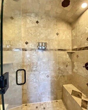 Combined shower/tub, hair dryer, towels, soap