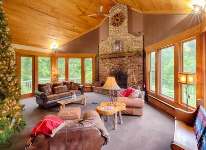 Beautiful spacious country home set on 22 acres that sleeps 27 people.