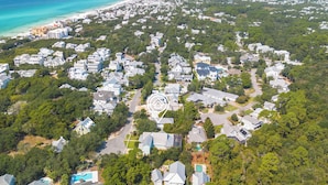 An aerial view of a residential area with houses, a beach, and a clear sky. - Great Location. Seaside/Old Seagrove, Private Pool,  3 Min Walk to Beach. (Santa Rosa Beach)