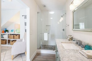 Shower, hair dryer, towels, soap