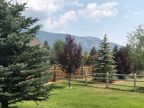 Surrounded by a tranquil forest, this serene setting offers a peaceful escape.