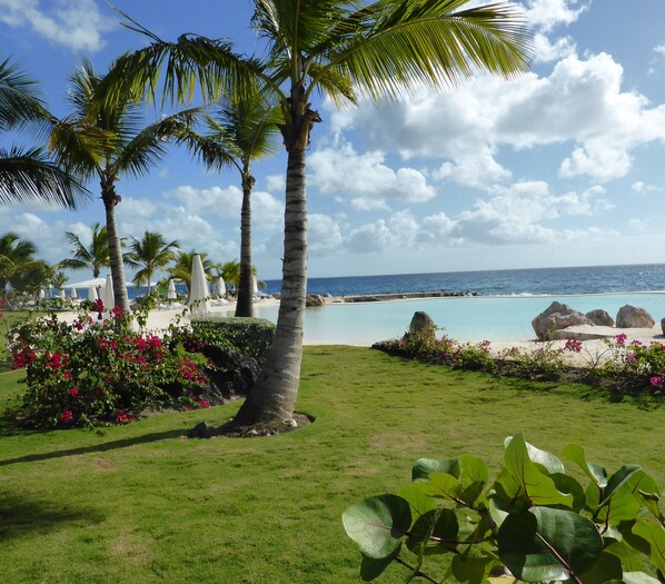 On the beach - Front of Caribbean Sea, <br>beautiful apart. with pools & direct access to sea. (Dominicus)