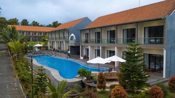 Family Room, Multiple Beds, Non Smoking, Pool View | Minibar, desk, soundproofing, free WiFi