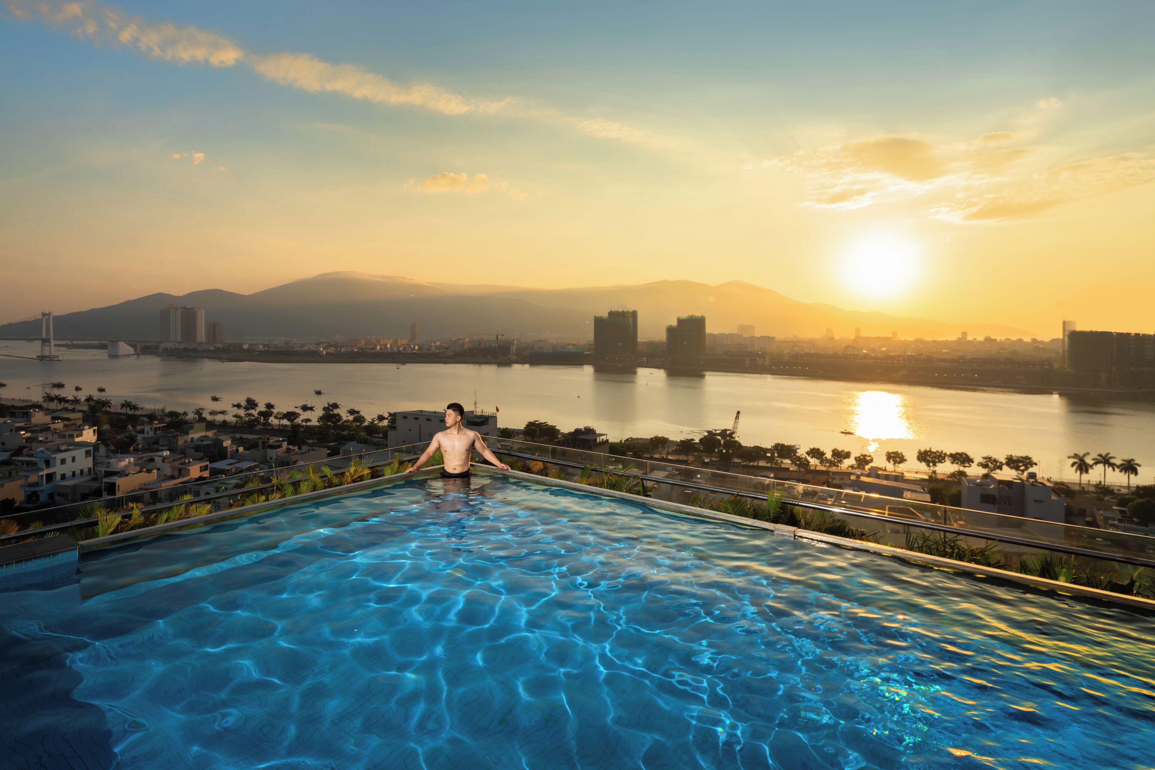 outdoor pool, pool umbrellas, pool loungers