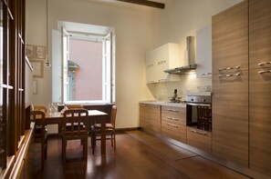 Apartment, 2 Bedrooms | Private kitchenette | Fridge, microwave, stovetop, dishwasher - UR-NEST Clavature - Piazza Maggiore Collection (Bologna)