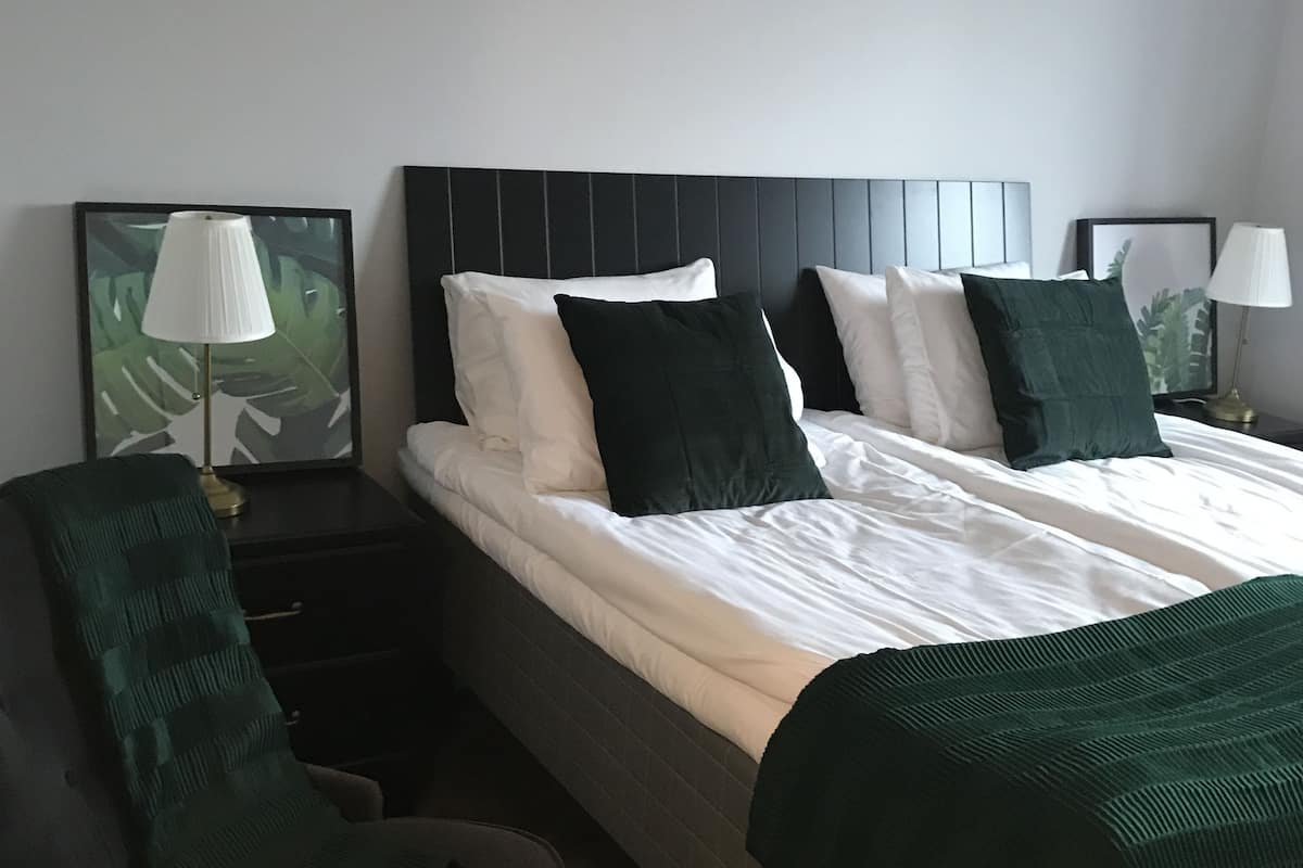 desk, blackout curtains, soundproofing, iron/ironing board