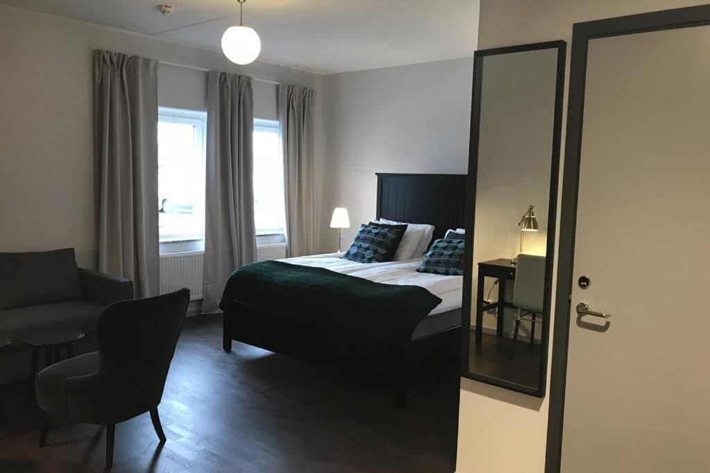 Desk, blackout curtains, soundproofing, iron/ironing board