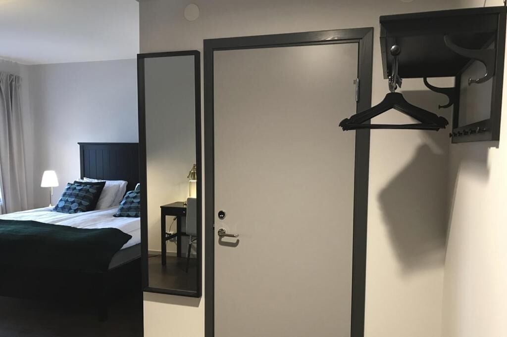 desk, blackout curtains, soundproofing, iron/ironing board