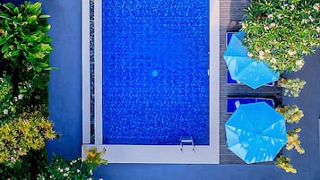 Outdoor pool, open 8:00 AM to 9:00 PM, pool umbrellas, sun loungers