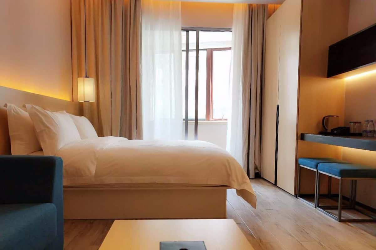 Superior Double Room | Minibar, desk, blackout drapes, iron/ironing board