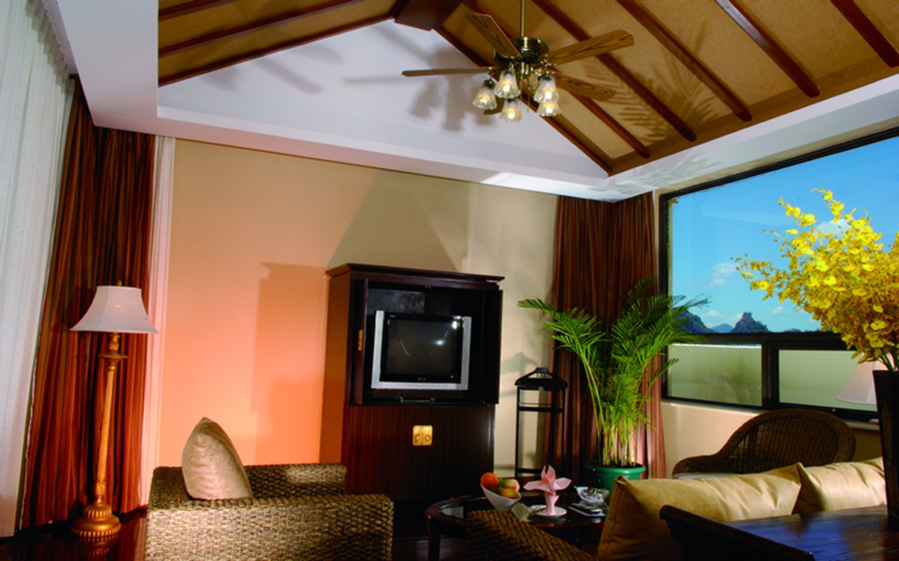 deluxe suite, mountain view | living area | lcd tv