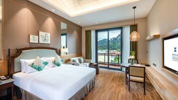 ダブルルーム | ミニバー、セーフティボックス (室内)、デスク、遮光カーテン