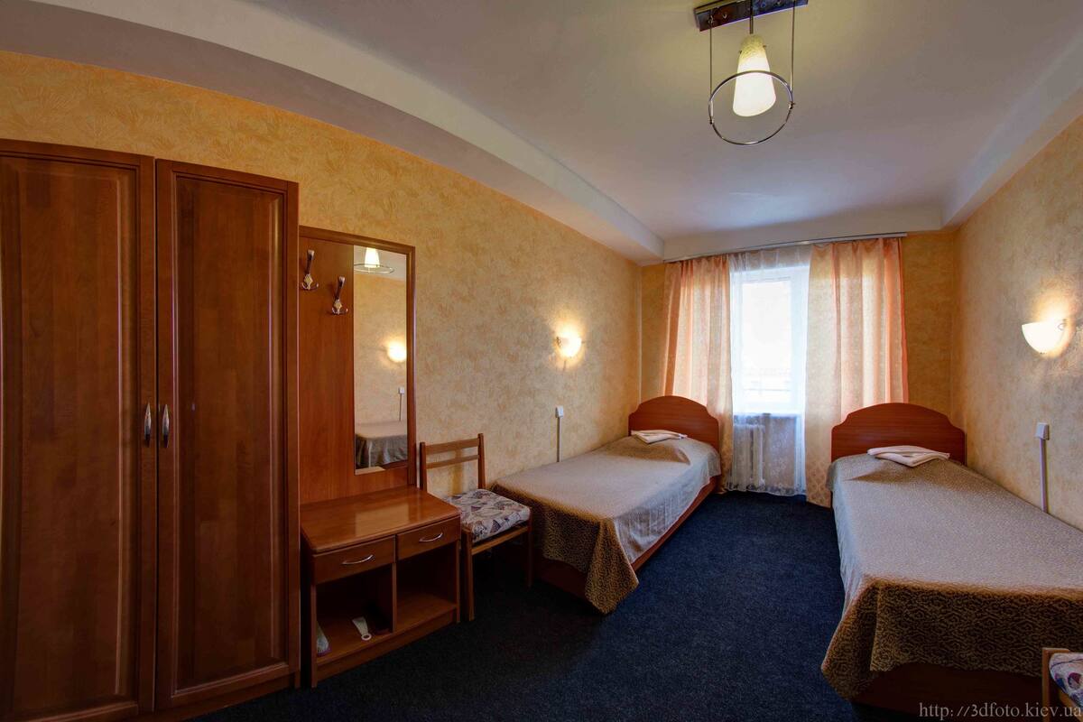 Economy Twin Room, Shared Bathroom | In-room safe, desk, iron/ironing board (on request), WiFi (free)