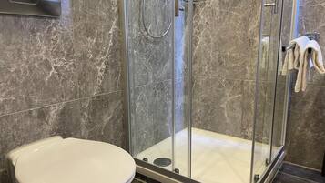 Shower, free toiletries, hair dryer, towels