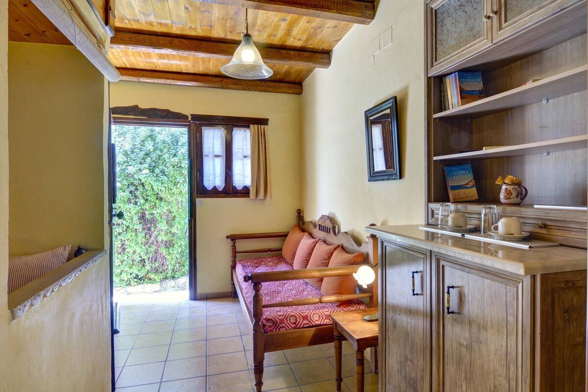 deluxe room | living area | tv