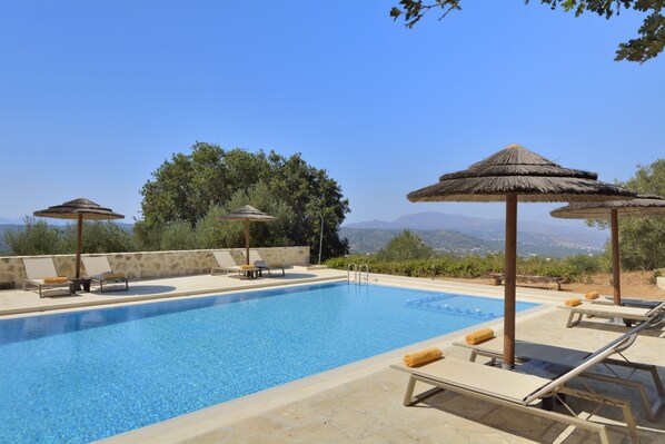 Outdoor pool, pool umbrellas, pool loungers