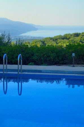 Outdoor pool, pool umbrellas, pool loungers