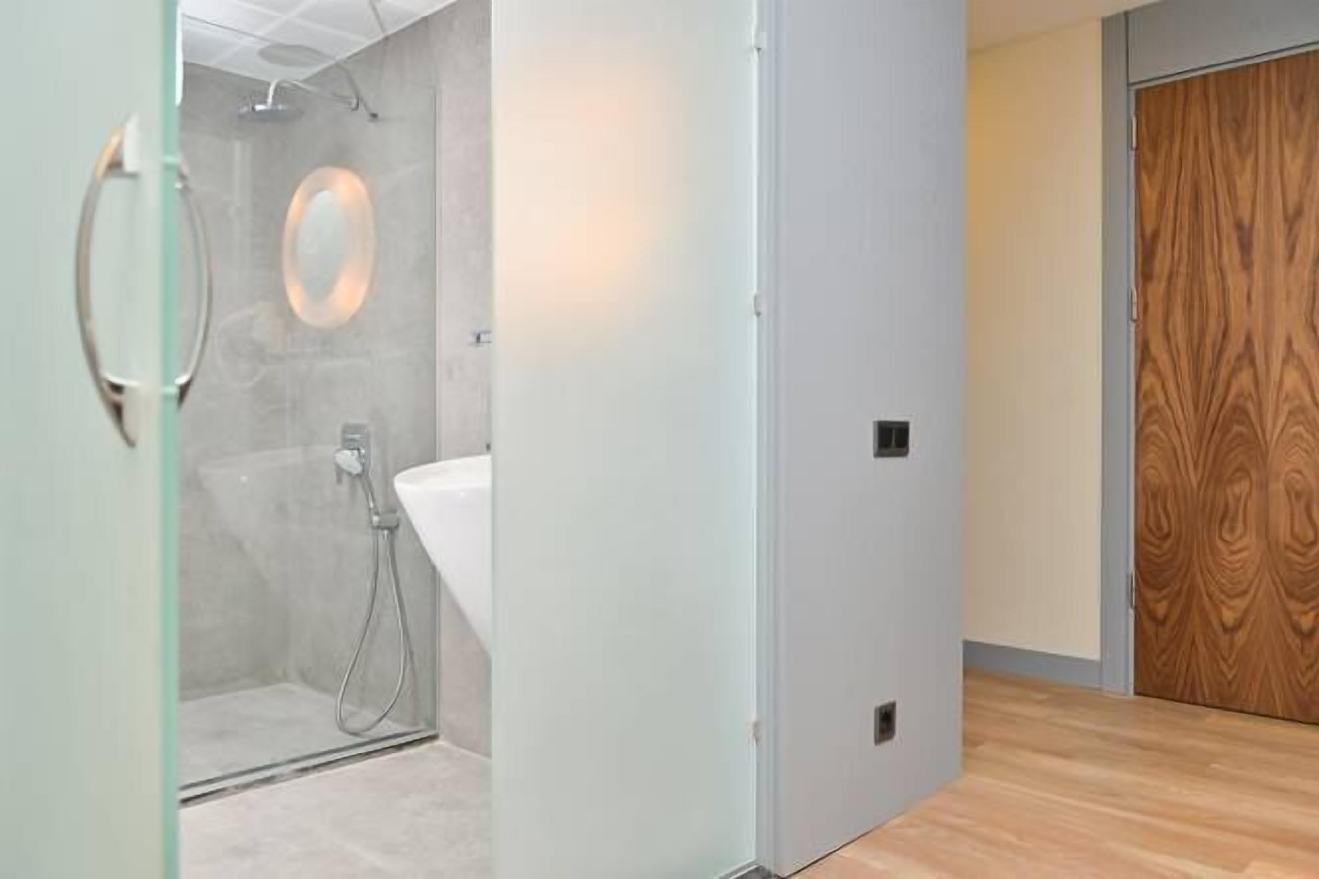 Shower, free toiletries, hair dryer, slippers