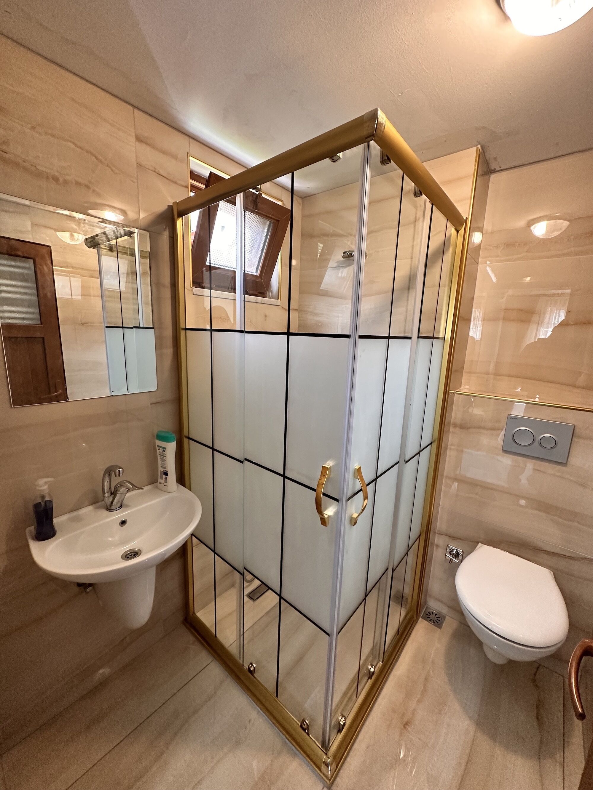 family room | bathroom | shower, free toiletries, hair dryer, slippers