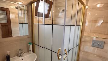 Shower, free toiletries, hair dryer, slippers