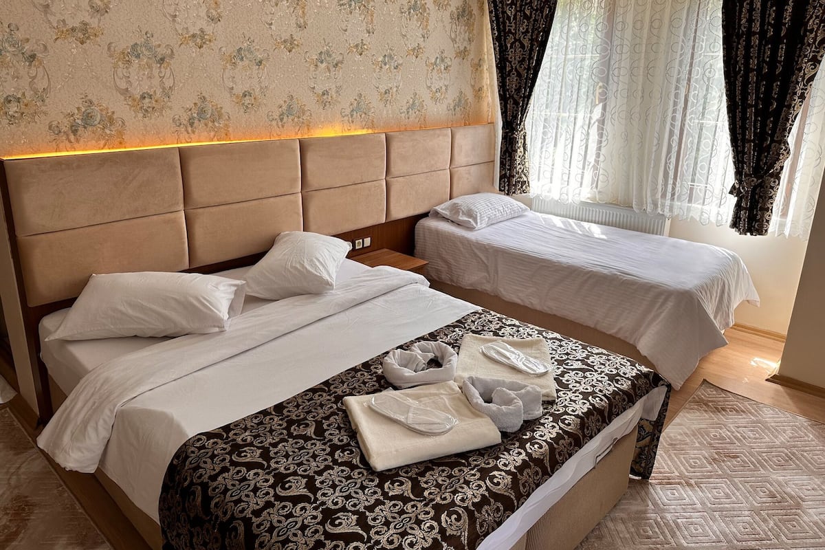 family room | premium bedding, individually decorated, desk, iron/ironing board