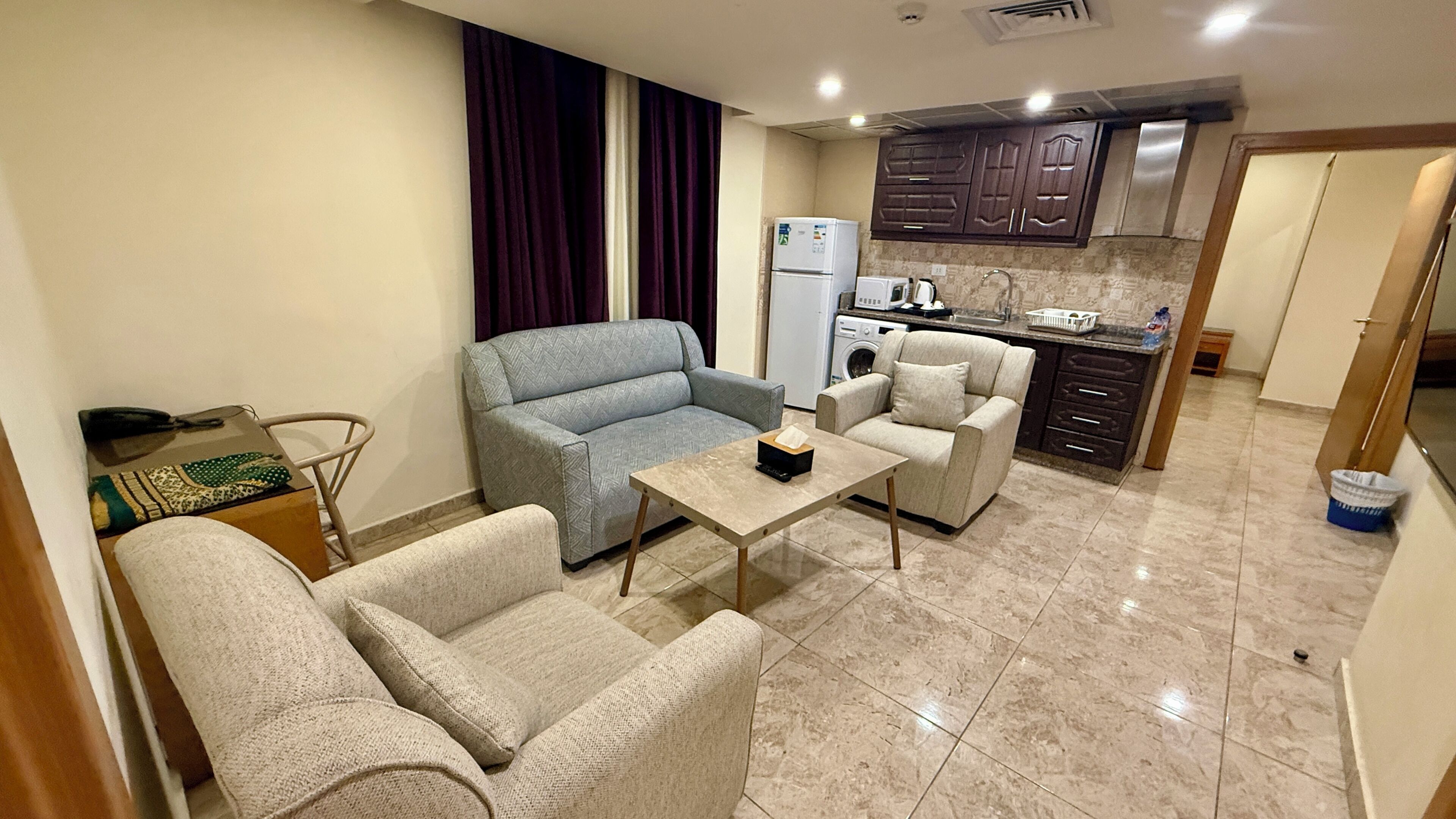 Two-Bedroom Apartment | Área de estar | TV de tela plana