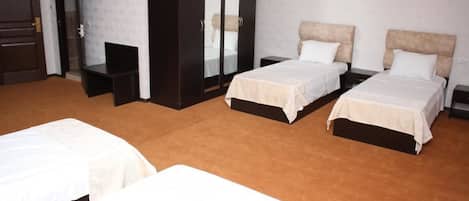 Standard Quadruple Room | Minibar, desk, iron/ironing board, free WiFi