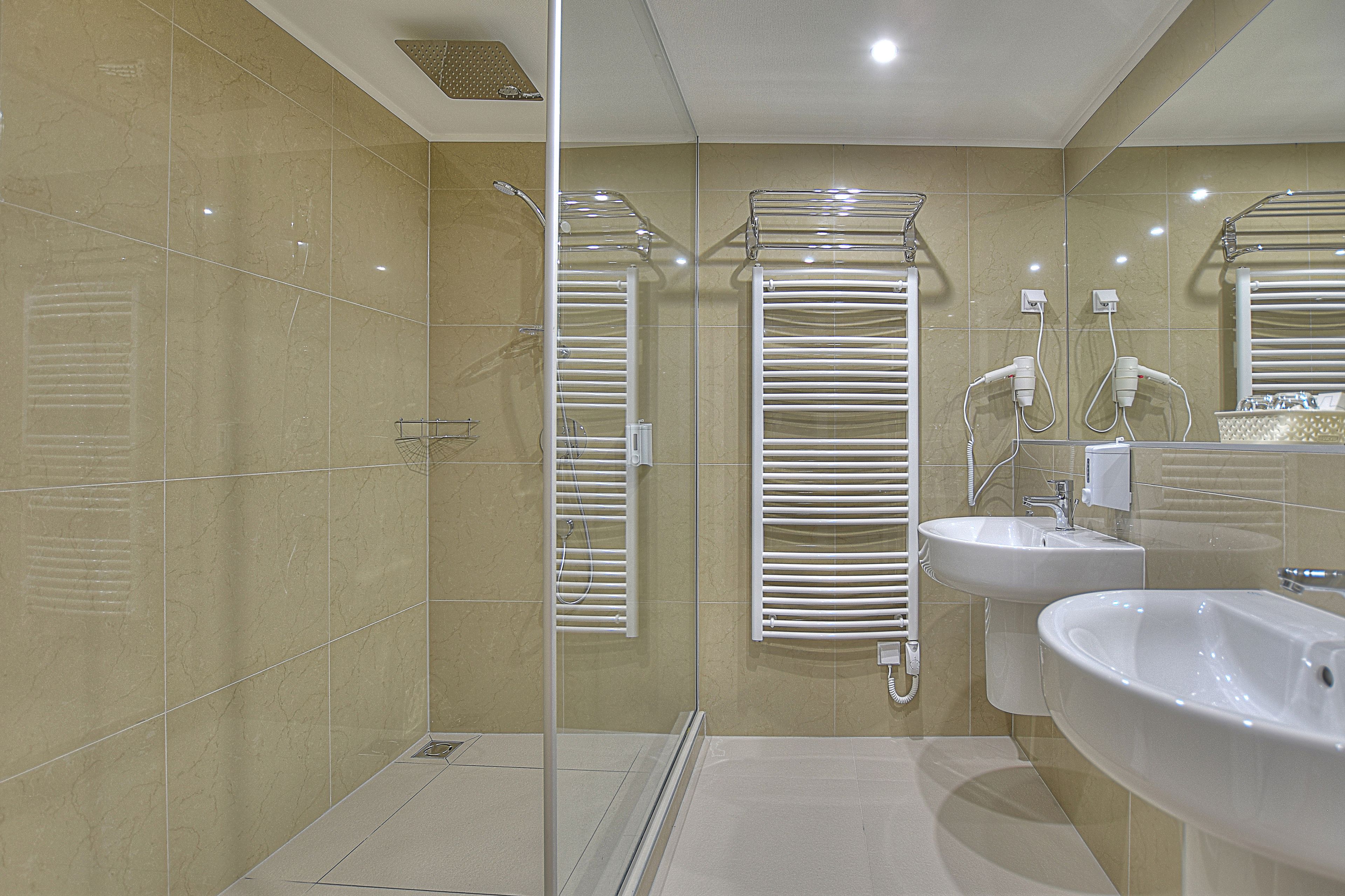 superior room, 1 king bed with sofa bed | bathroom | shower, free toiletries, towels