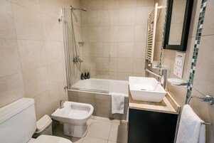 Studio Apartment | Bathroom | Hair dryer, bidet, towels, soap