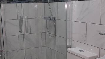 Shower, free toiletries, hair dryer, towels
