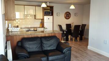 Apartment, 2 Bedrooms (Sleep 5) | Living area | Flat-screen TV