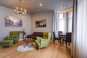 Premium Apartment, 1 Bedroom, Kitchenette, River View (55 sqm) | Living area | 110-cm flat-screen TV with satellite channels, TV