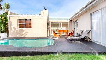 Outdoor pool, pool umbrellas, pool loungers