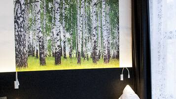 Minibar, skrivbord, ljudisolering och strykjärn/strykbräda