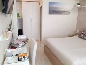 Italienske Frette-laken, sengetøy av topp kvalitet og minibar