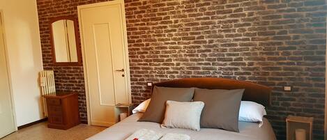 Apartment, 1 Bedroom | 1 bedroom, soundproofing, iron/ironing board, cribs/infant beds