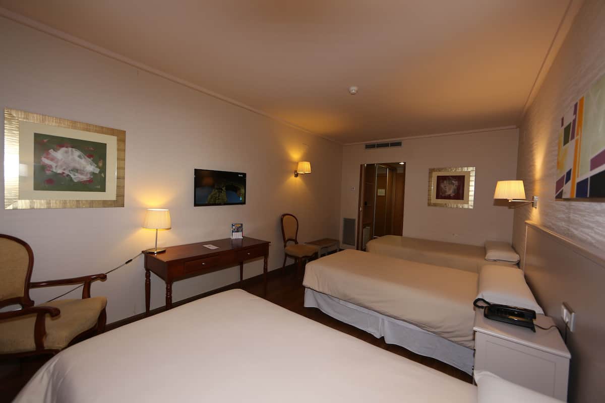 triple room | desk, blackout curtains, soundproofing, iron/ironing board