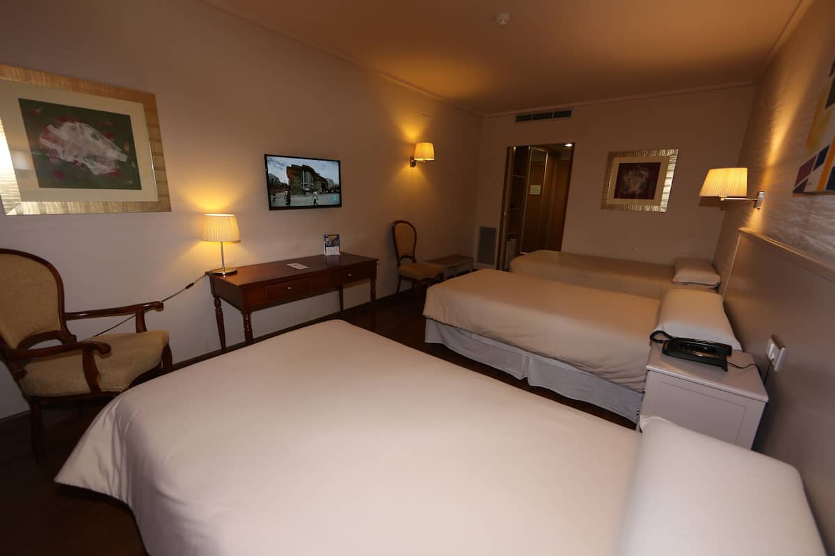 triple room | desk, blackout curtains, soundproofing, iron/ironing board