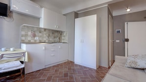 Studio (Via dei Pepi 17, Florence) | Living area | Flat-screen TV - Marchesino Apartments by Home Sharing (Florence)