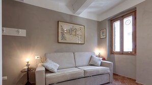 Studio (Via dei Pepi 17, Florence) | Living area | Flat-screen TV - Marchesino Apartments by Home Sharing (Florence)