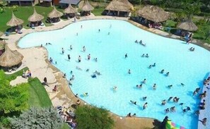 2 outdoor pools, a waterfall pool