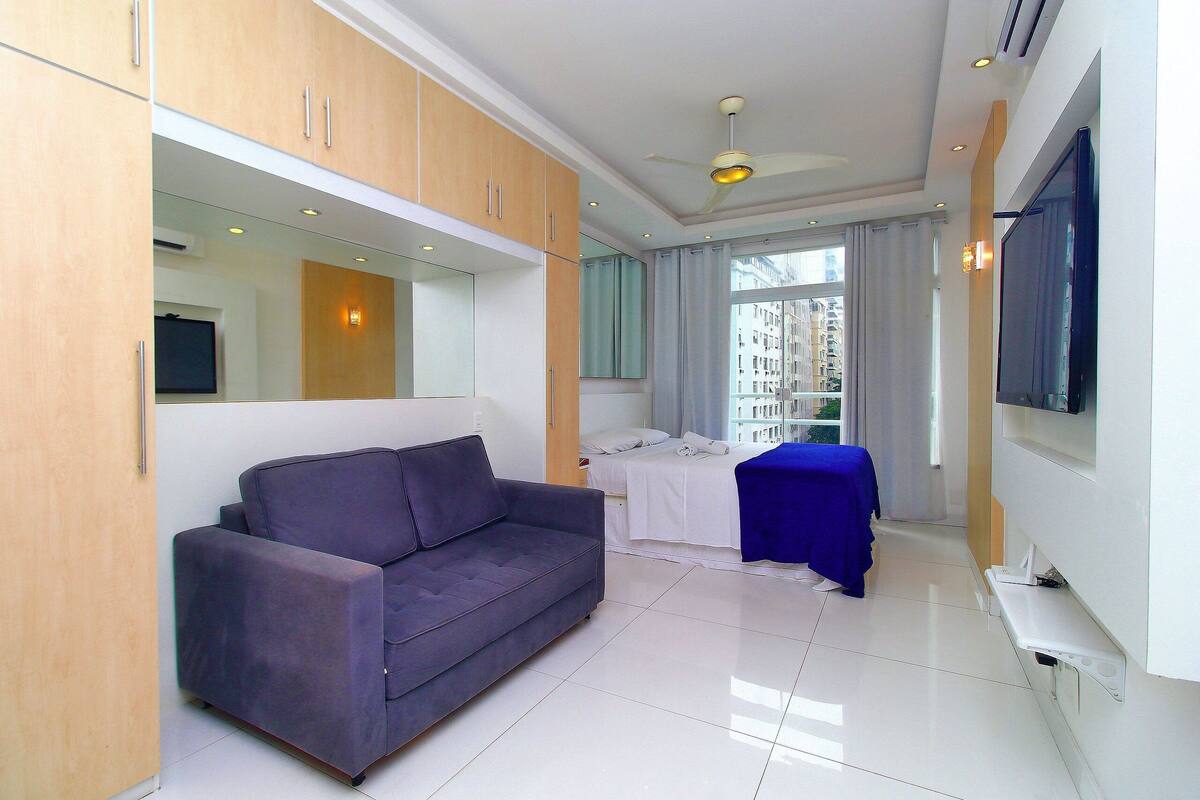 Premium bedding, laptop workspace, blackout curtains, iron/ironing board