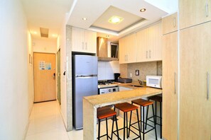 Appartement (C033) | Cuisine privée | Réfrigérateur, micro-ondes, cafetière/bouilloire