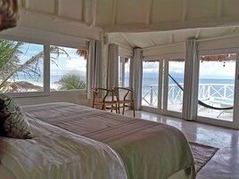 Master Suite Oceanfront Terrace /Jacuzzi | 1 bedroom, premium bedding, in-room safe, individually decorated