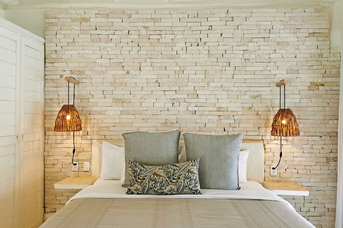 partial ocean view room pool area | 1 bedroom, premium bedding, in-room safe, individually decorated