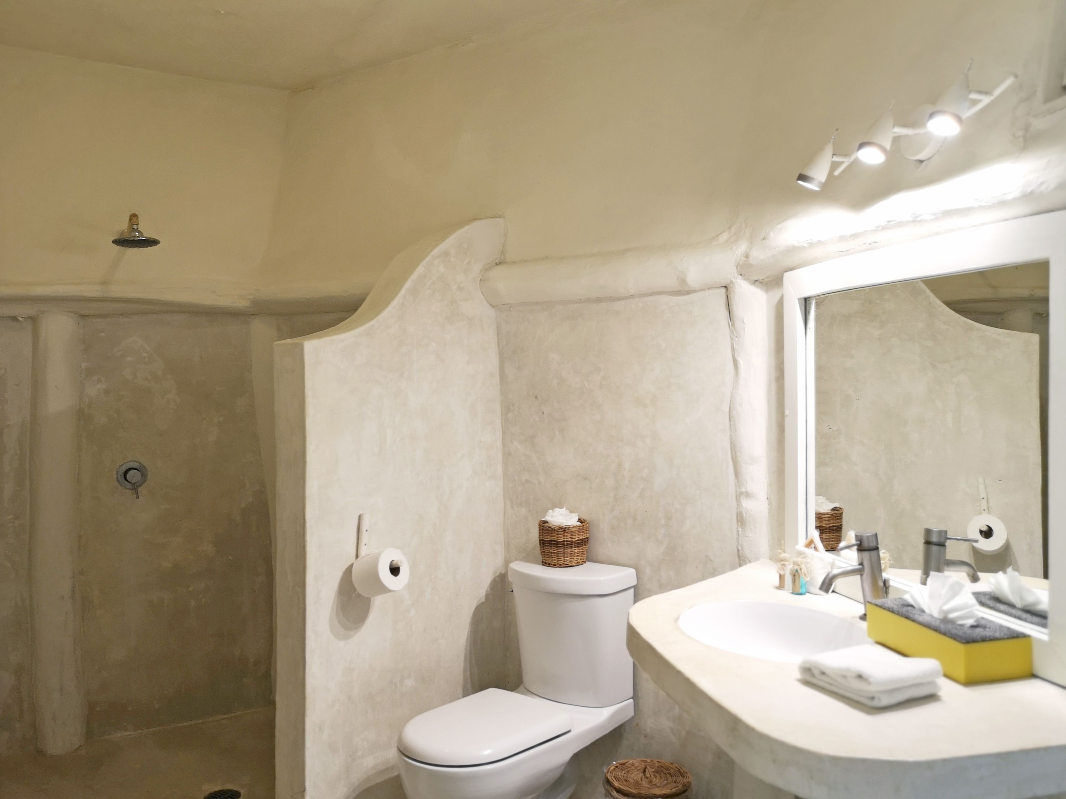 partial ocean view room pool area | bathroom | shower, free toiletries, towels, soap